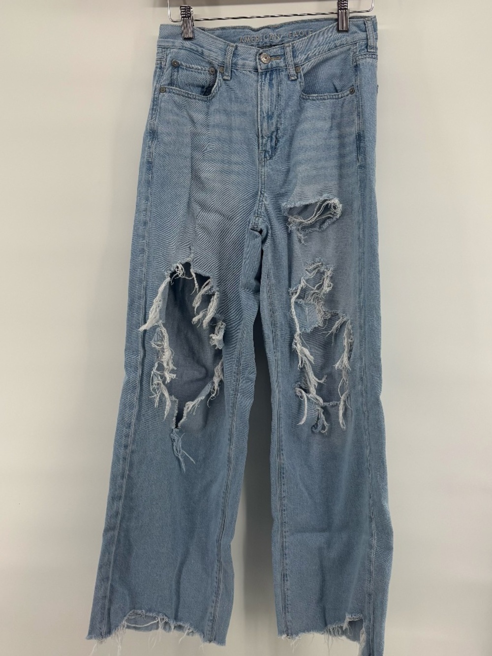 American Eagle wide leg distressed light wash high rise jeans size 2